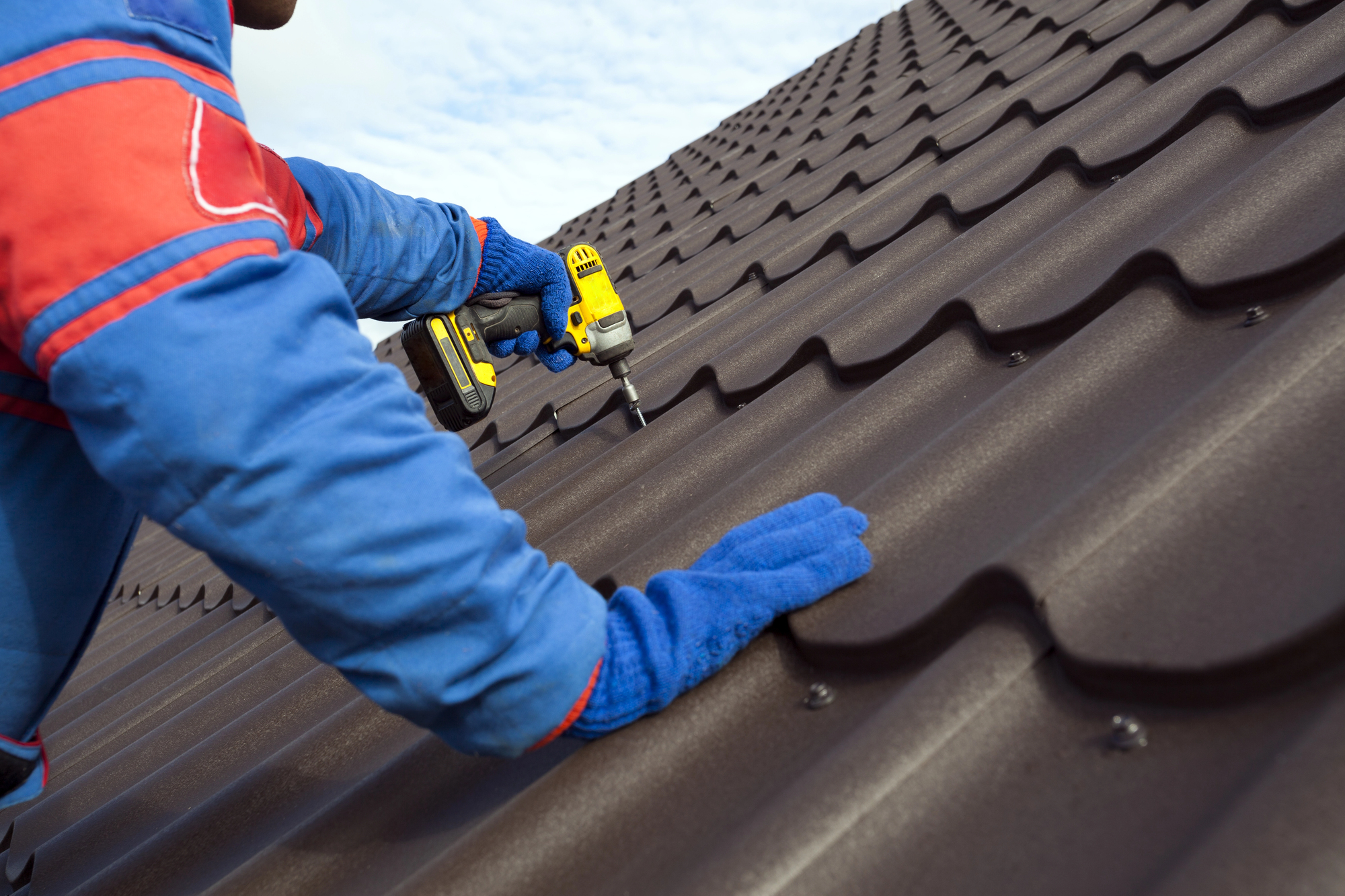 Local roofing crew on a home