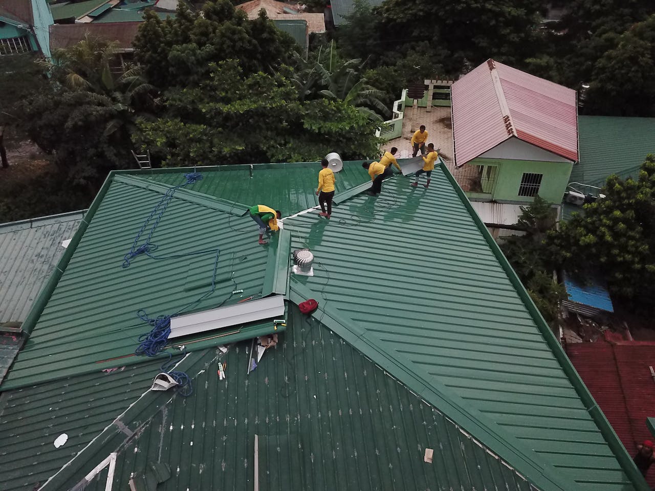 Roofing contractors on site